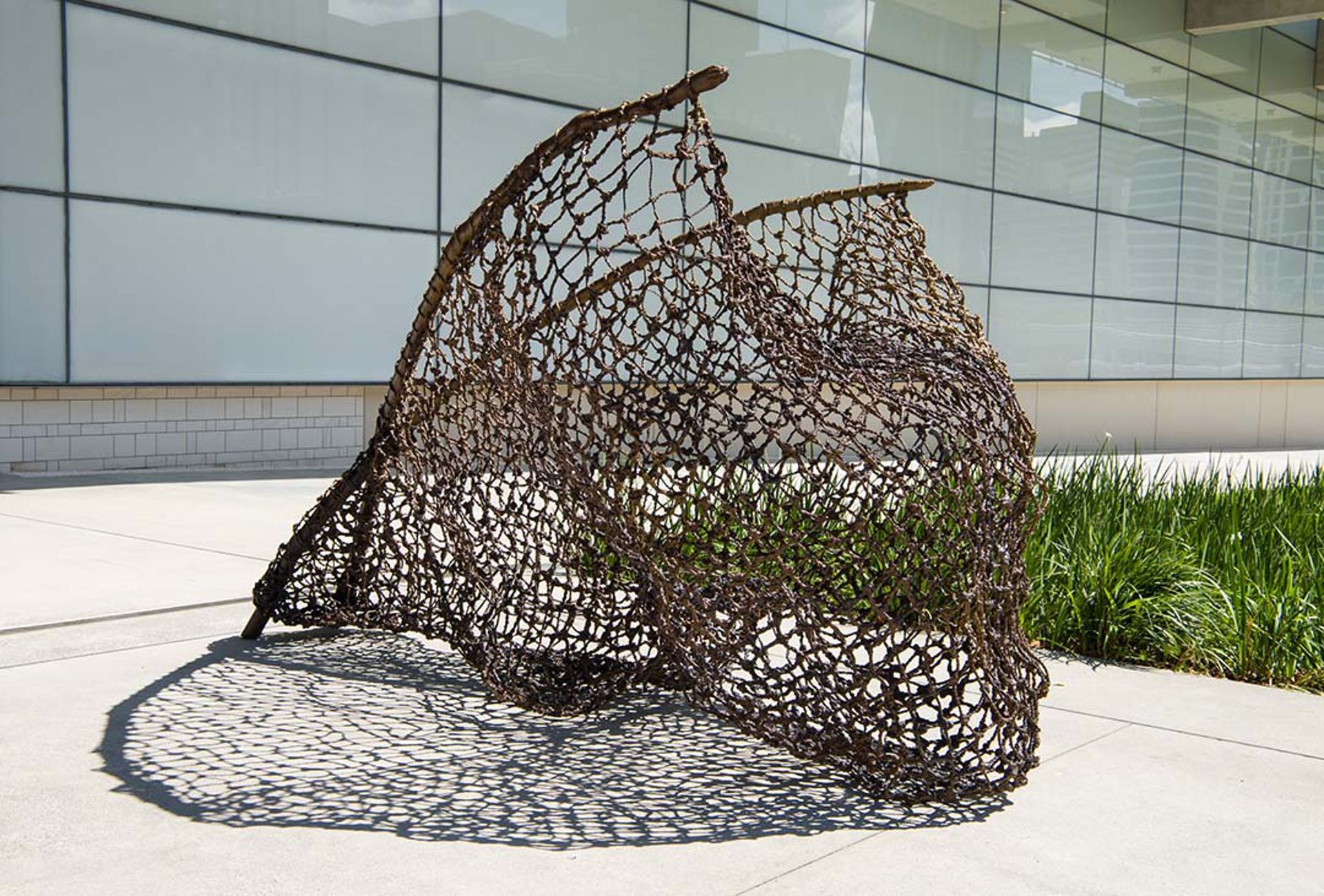 Judy Watson, Waanyi people, Australia b.1959 / tow row 2016 / Bronze / Commissioned 2016 to mark the tenth anniversary of the opening of the Gallery of Modern Art. This project has been realised with generous support from the Queensland Government, the Neilson Foundation and Cathryn Mittelheuser, AM through the Queensland Art Gallery | Gallery of Modern Art Foundation / Collection: Queensland Art Gallery / © The artist