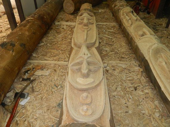 Koromb (Spirit house) post carvings by Simon Goiyap (left), and Nelson Makamoi and Jamie Jimok (right), February 2012 / Photograph: Simon Goiyap