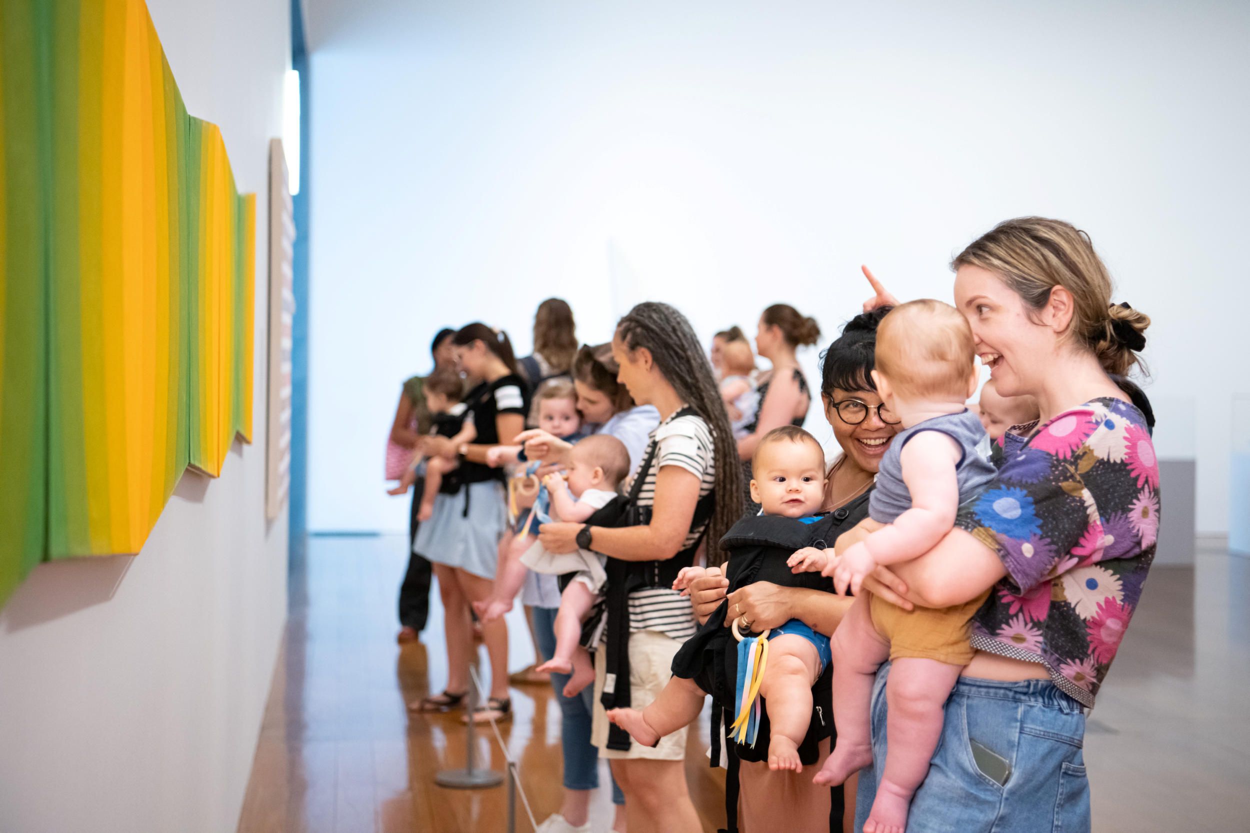 Art Starters participants looking at an artwork, 2023 / ©QAGOMA / Photo: C Callistemon