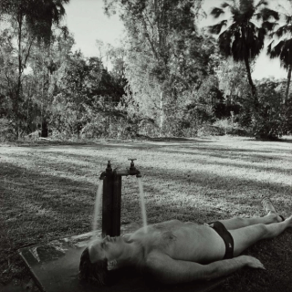 Max Pam, Australia b.1949 / Man cooling off, Lawn Hill National Park (from ‘Journeys north’ portfolio) 1986 / Gelatin silver photograph on paper / 28.3 x 28.3cm (comp.) / Acc. 1987.167.020 / Purchased 1987 with the financial assistance of the Australian Bicentennial Authority to commemorate Australia’s Bicentenary in 1988 / Collection: Queensland Art Gallery | Gallery of Modern Art