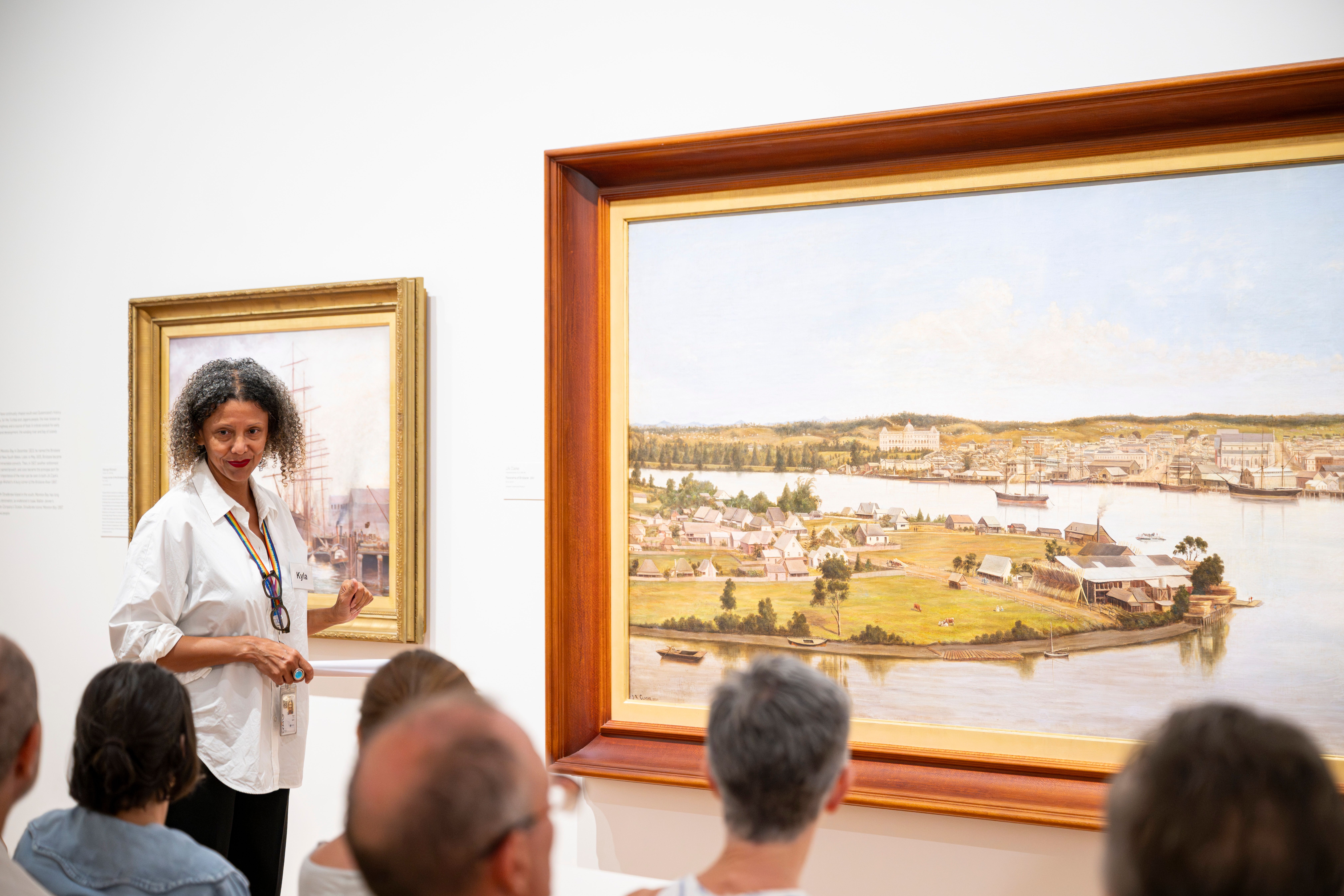 Art and Dementia program participants engage in guided slow-viewing of Joseph Augustus Clarke, Australia 1840–1890 / Panorama of Brisbane 1880 / Oil on canvas / 137 x 366cm / Collection: Queensland Museum / Photograph: C Callistemon / © QAGOMA