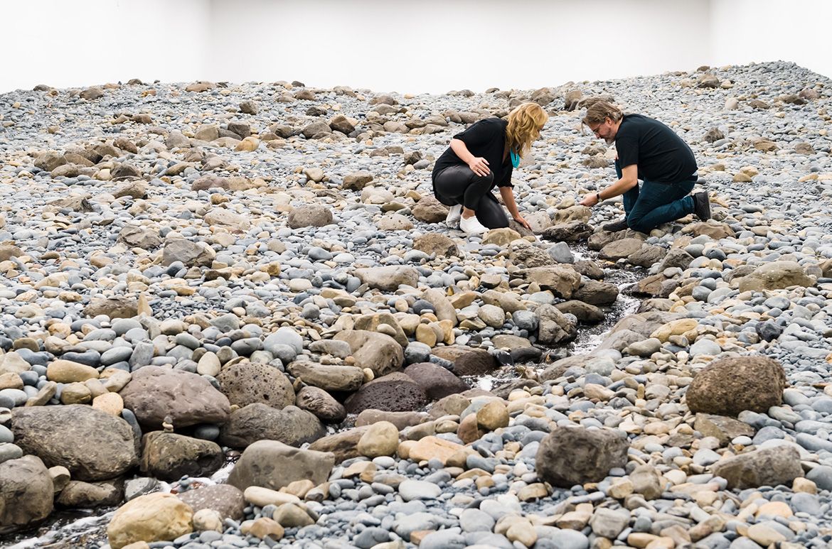 Geraldine Kirrihi Barlow and Olafur Eliasson with Riverbed 2014 (installation view, Gallery of Modern Art, Brisbane 2019) / Water, rock (volcanic stones [blue basalt, basalt, lava], other stones, gravel, sand), wood, steel, plastic sheeting, hose, pumps / Purchased 2021. The Josephine Ulrick and Win Schubert Charitable Trust. Collection: The Josephine Ulrick and Win Schubert Charitable Trust, QAGOMA / Collection: Queensland Art Gallery | Gallery of Modern Art / © 2014 Olafur Eliasson / Photograph: N Harth © QAGOMA