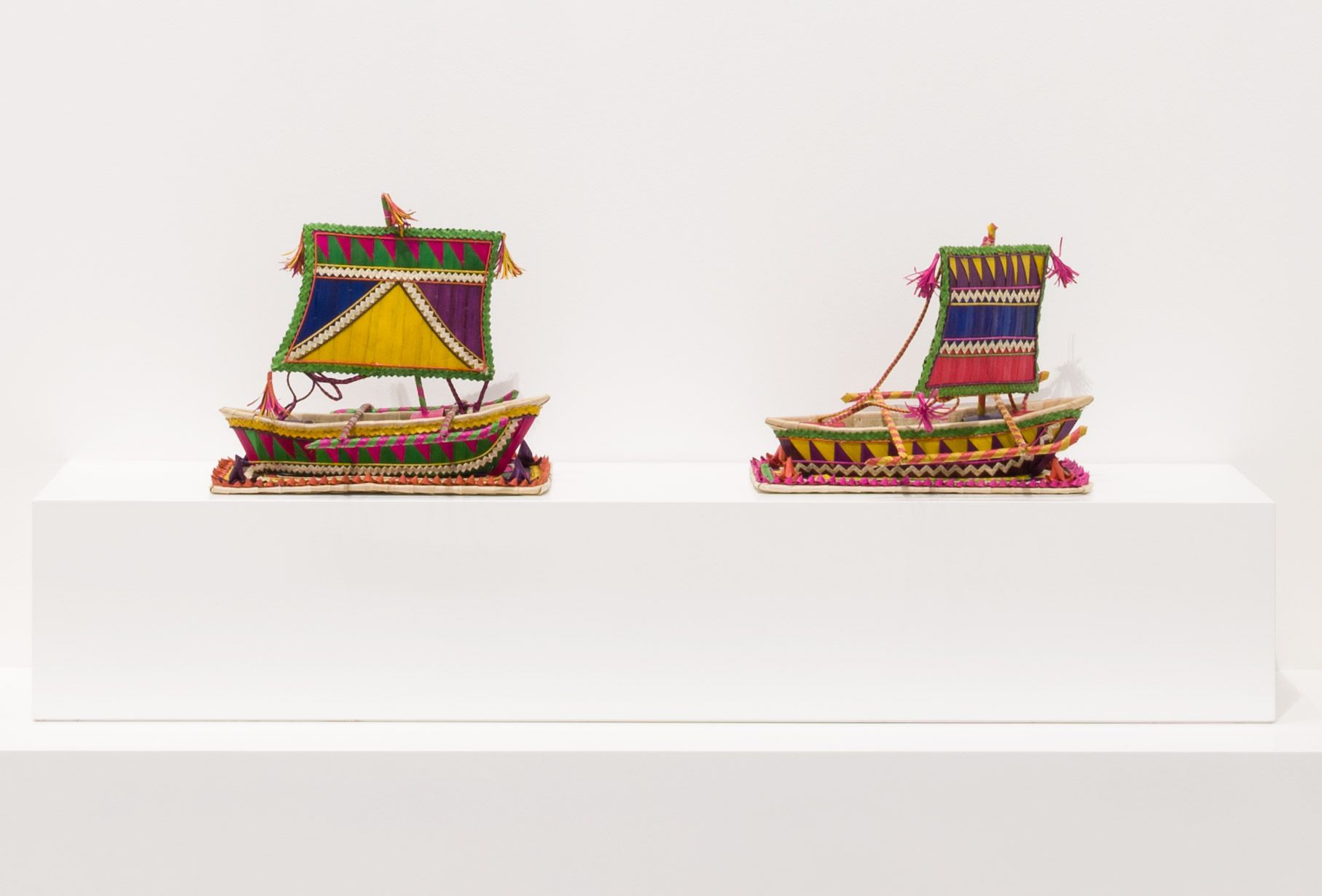 A view of woven Tondaan (boats) by Rhudsia Jamih Mohammad, installed for the 11th Asia Pacific Triennial, GOMA, November 2024 / Sama people / The Philippines b.1959 / Lives and works in Nunukan, Sibutu, Tawi-Tawi Province, The Philippines / Purchased 2024 with funds from the Bequest of Noela Clare Deutscher, in memory of her parents, A. Evans Deutscher and Clare Deutscher, through the Queensland Art Gallery | Gallery of Modern Art Foundation / © Rhudsia Jamih Mohammad / Photograph: C Callistemon, QAGOMA
