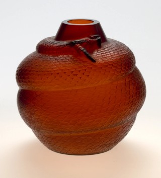 René Lalique, France 1860–1945 / Serpent vase c.1924 / Dark amber frosted with moulded glass / 25 x 26cm / Bequest of Emanuel Theodore Cassimatis in memory of his parents Theodore and Stella Cassimatis through the QAGOMA Foundation 2019 / Collection: Queensland Art Gallery | Gallery of Modern Art