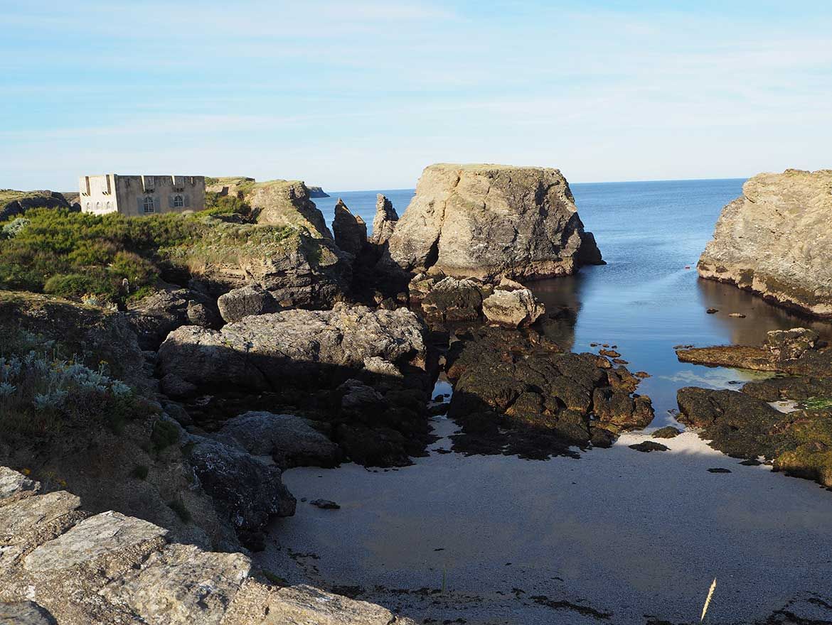 The Pointe des Poulains, Belle-Île, France, June 2018, with the Château of Sarah Bernhardt in the upper left / Photograph: Roger Benjamin