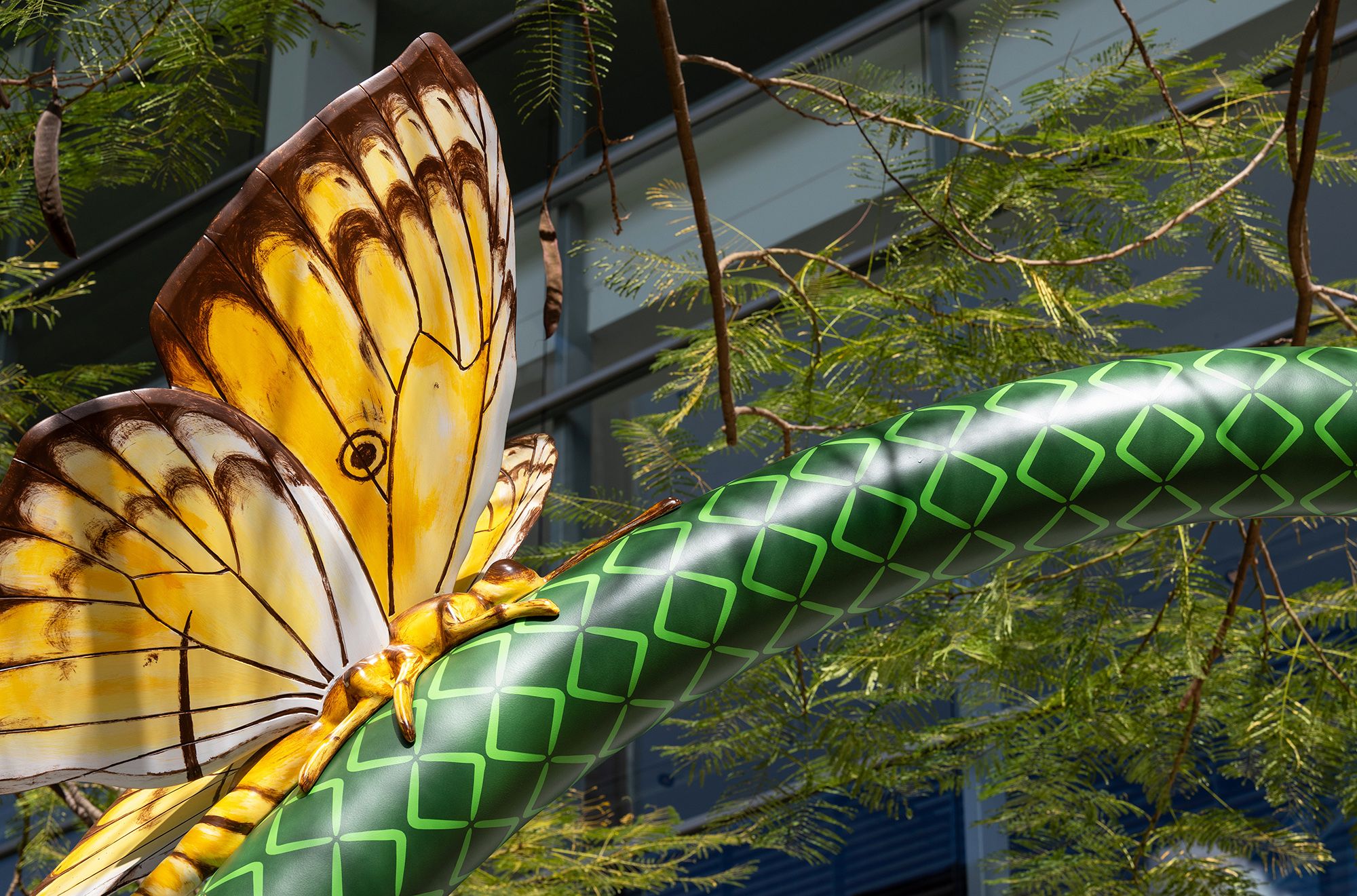 Tony Albert, Girramay/Yidinyji/Kuku Yalanji peoples, Australia b.1981 / Nell, Australia b.1975 / The Big Hose (detail) 2022–25 / Aluminium, reclaimed hardwood, paint, rubber / Commissioned 2022. This project has been realised with generous support from Andrew and Dr Susan King, the Neilson Foundation, Margaret Mittelheuser AM and Cathryn Mittelheuser AM, Gina Fairfax AC, Dr Shirley Hsieh, and the 2022 QAGOMA Foundation Appeal / Collection: Queensland Art Gallery | Gallery of Modern Art / © Tony Albert and Nell / Photograph: N Umek © QAGOMA