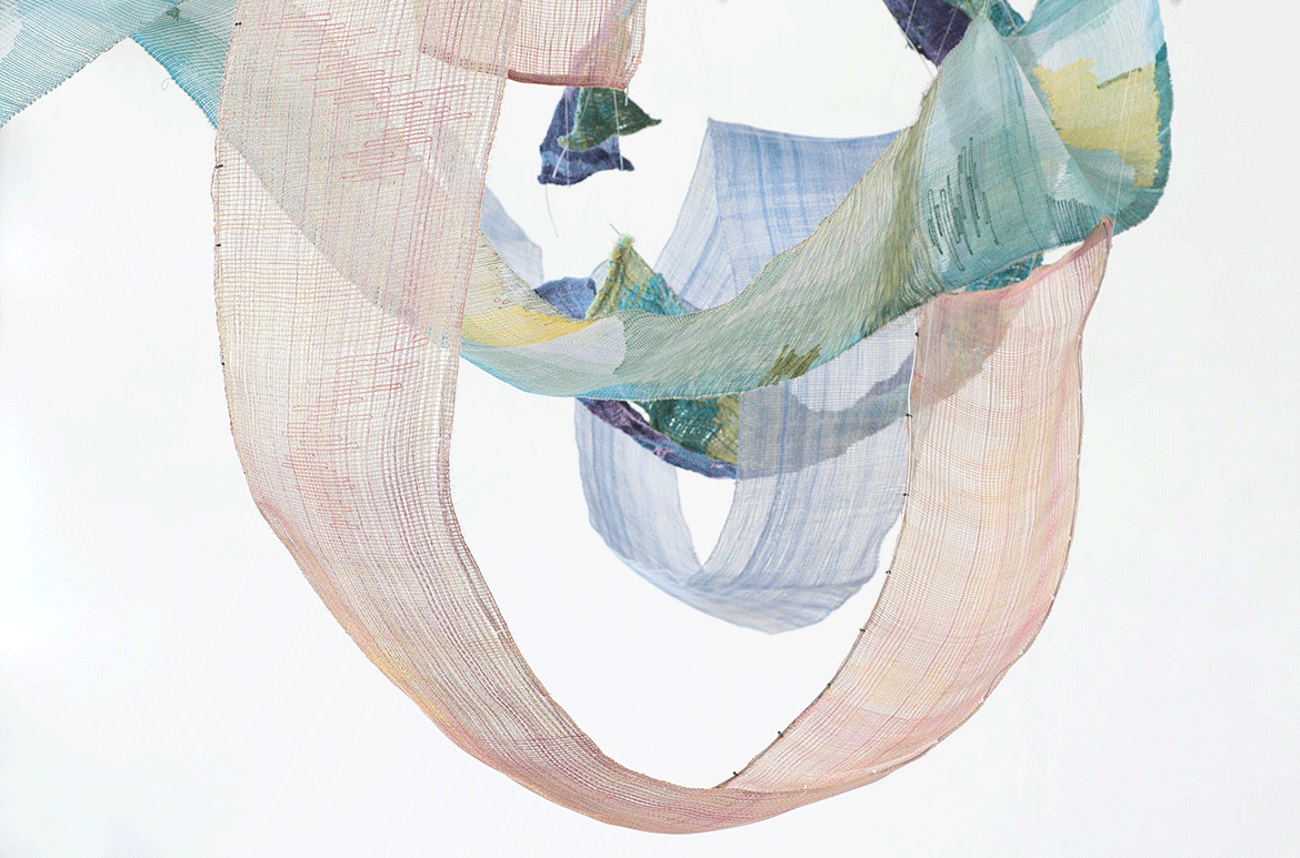 Yuma Taru, Atayal people, Taiwan b.1963 / The spiral of life – the tongue of the cloth (yan pala na hmali) – a mutual dialogue (installation view) 2021 / Ramie suspended from metal threads / 500 x 250cm / Commissioned for APT10 / © & courtesy: Yuma Taru