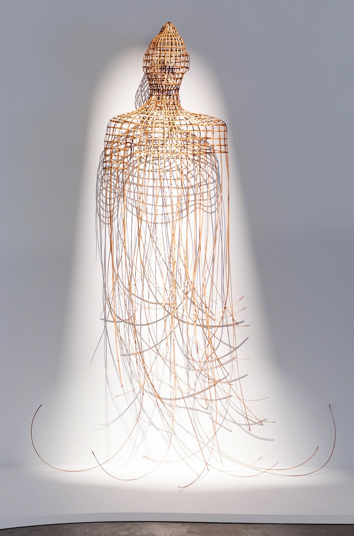 Sopheap Pich, Cambodia b.1971 / Buddha (from the ‘1979’ series) 2009 installed in ‘Iris van Herpen: Sculpting the Senses’, GOMA 2024 / Rattan, wire, dye / Purchased 2010 with funds from the Estate of Lawrence F King in memory of the late Mr and Mrs SW King through the QAG Foundation / Collection: Queensland Art Gallery │ Gallery of Modern Art / © Sopheap Pich / Photograph: N Umek © QAGOMA