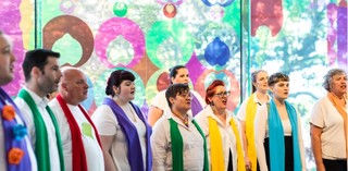 Brisbane Pride Choir performing at APT10 Opening Weekend in front of Shannon Novak's APT10 artwork, 81 Percent (Australia): Someone you know (from 'Make Visible: Queensland') (installation view) 2021 / December 2021 / Gallery of Modern Art / Photography: Katie Bennett, QAGOMA