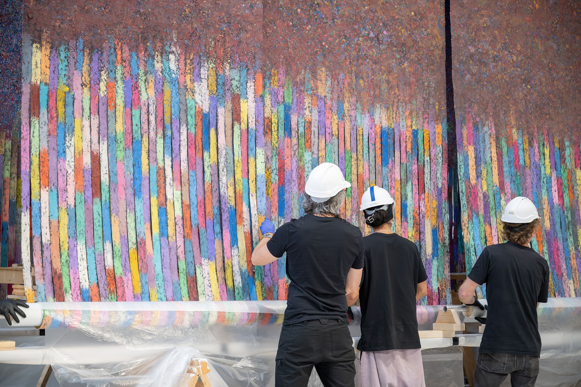Mit Jai Inn, Thailand b.1960 / Installation of Untitled (Tunnel #APT) 2024 / Oil on canvas / Eight parts: 150 × 1200cm (each, approx.) / Site specific work commissioned for ‘The 11th Asia Pacific Triennial of Contemporary Art’, Queensland Art Gallery Watermall, 2024 / © Mit Jai Inn / Courtesy: The artist and Silverlens, Manila and New York / Photograph: N Umek © QAGOMA