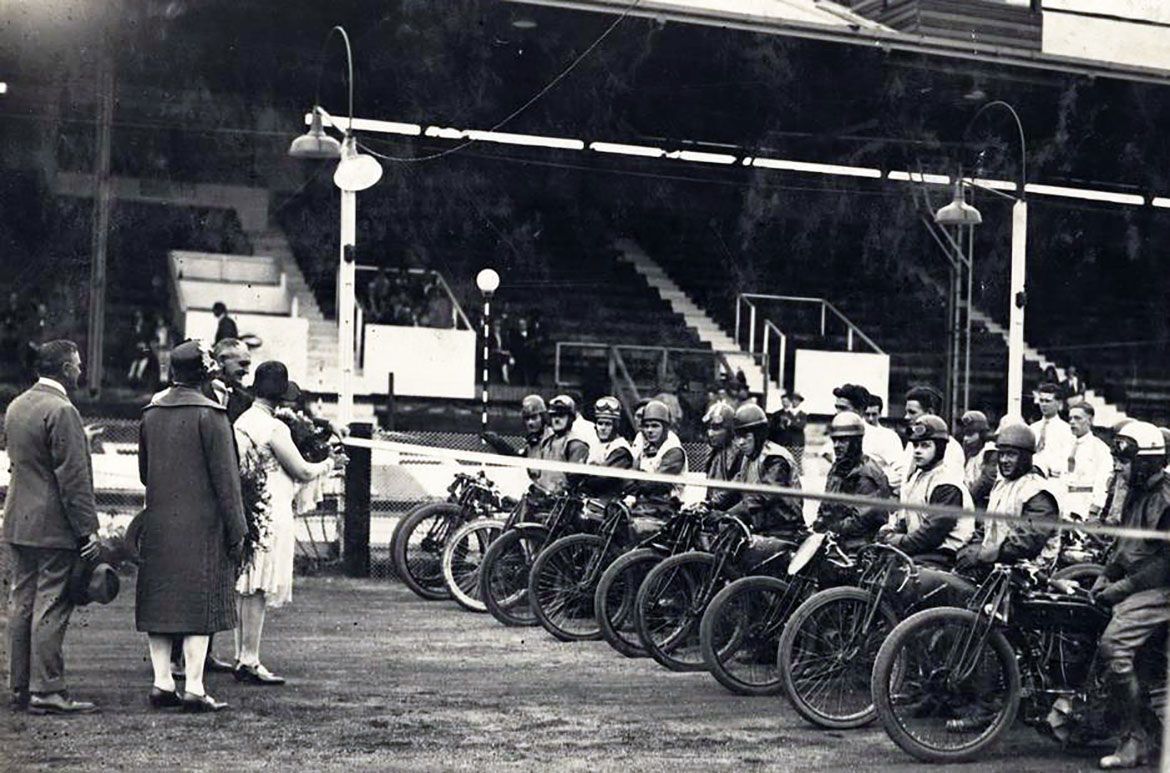 Officials cutting the starting ribbon at a speedway motorcycle race in Brisbane, 1930 / Image courtesy State Library of Queensland, Brisbane