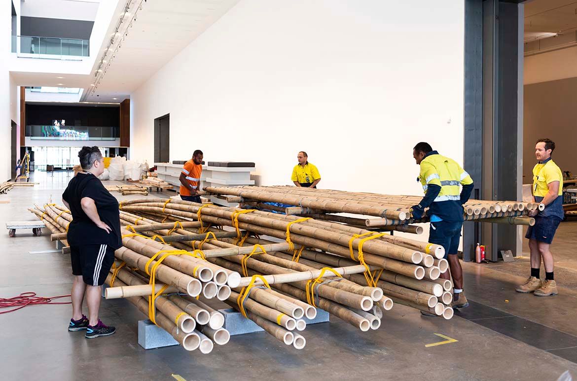Salote Tawale, Fiji/Australia b.1976 / No Location 2021 / Bamboo, nylon rope, cotton, polycarbonate, sheeting, tarpaulin and found objects / 300 x 240 x 1350cm (approx.) / Commissioned for ‘The 10th Asia Pacific Triennial of Contemporary Art (APT10). Purchased 2021 with funds from the Jennifer Taylor Bequest through the Queensland Art Gallery l Gallery of Modern Art Foundation / Collection: Queensland Art Gallery | Gallery of Modern Art, Brisbane / This project has been assisted by the Australian Government through the Australia Council, its arts funding and advisory body, and the Visual Arts and Craft Strategy, an initiative of the Australian State and Territory Governments / © Salote Tawale