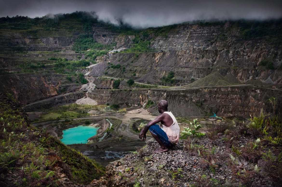 Taloi Havini (artist) b.1981, Hakö (Haku) people, Nakas clan / Stuart Miller (photographer) b.1983 / Russel and the Panguna mine (from ‘Blood Generation’ series) 2009, printed 2014 / Digital print on Cansen Infinity Pantine Fibre Rag 310gsm paper / Purchased 2014. Queensland Art Gallery | Gallery of Modern Art Foundation / Collection: Queensland Art Gallery / © The artists