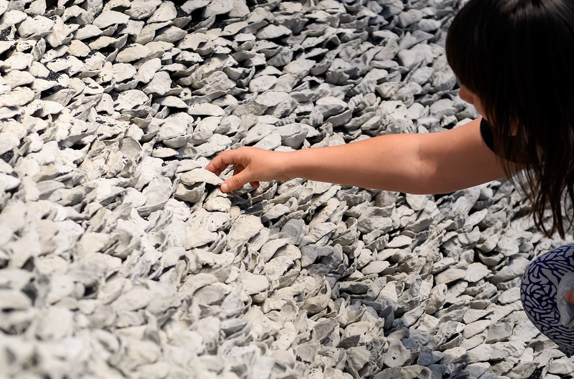 Megan Cope, Quandamooka people, Australia b.1982 / RE FORMATION 2019 / 12 000 pieces of cast-concrete, ilmenite / Purchased 2019 with funds from the Contemporary Patrons through the Queensland Art Gallery | Gallery of Modern Art Foundation / Collection: Queensland Art Gallery | Gallery of Modern Art / © Megan Cope