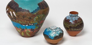 (l-r) Hermannsburg Potters, Northern Territory, Australia est. 1990 / Irene Mbitjana Entata, Arrernte/Luritja people, Australia 1946–2014 / Pmere (My country) 1996 / Earthenware, hand-built terracotta clay with underglaze colours and synthetic polymer paint / 42 x 44cm (diam.) / Purchased 1996. QAG Foundation / © Irene Mbitjana Entata / Noreen Ngala Hudson, Arrernte people, Australia b.1947 / Pot: Pmere Nuka (My country) 1994 / Earthenware, hand-built terracotta clay with underglaze colours and applied decoration / pot: 16 x 20cm (diam.); lid:1.7 x 6.4cm (diam.) / Pot: Pmere Nuka (My country) 1994 / Earthenware, hand-built terracotta clay with underglaze colours / 28 x 17cm (diam.) / Purchased 1995. QAG Foundation / Collection: Queensland Art Gallery | Gallery of Modern Art / © Noreen Ngala Hudson/Copyright Agency