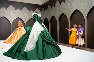 Tarsem Singh (director), Eiko Ishioka (designer), Carelli Costumes (costumiers) / ‘Green dress’ costume from Mirror Mirror 2012, installed in ‘Fairy Tales’, Gallery of Modern Art (GOMA) Brisbane 2023 / Silk, synthetic taffeta, nylon netting, plastic / Collection: The Academy Museum of Motion Pictures, Los Angles / © 2012 UV RML NL Assets LLC. / Photograph: N Umek © QAGOMA
