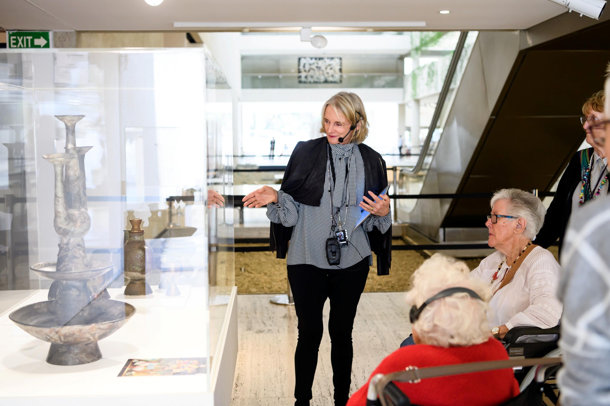 A volunteer guided tour for visitors with hearing loss at the Queensland Art Gallery. Photography: C. Callistemon © QAGOMA