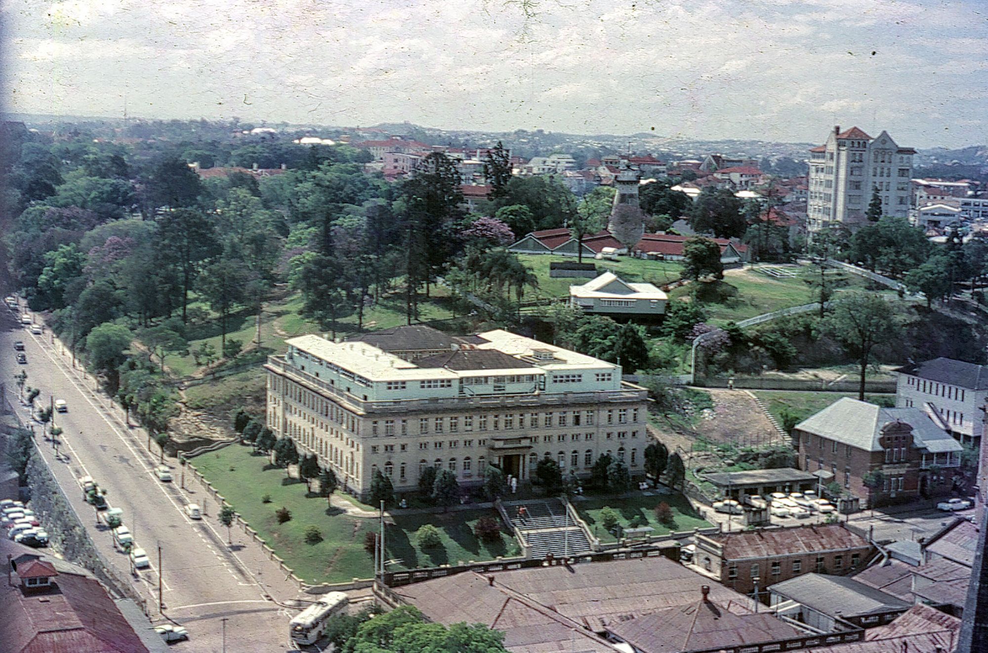 Brisbane Dental College, corner Turbot and Albert Streets, the YMCA Sailors Department, with Craigston apartments and the Observatory in the background, 1961 / 99183982284802061 / Courtesy: John Oxley Library, State Library of Queensland, Brisbane