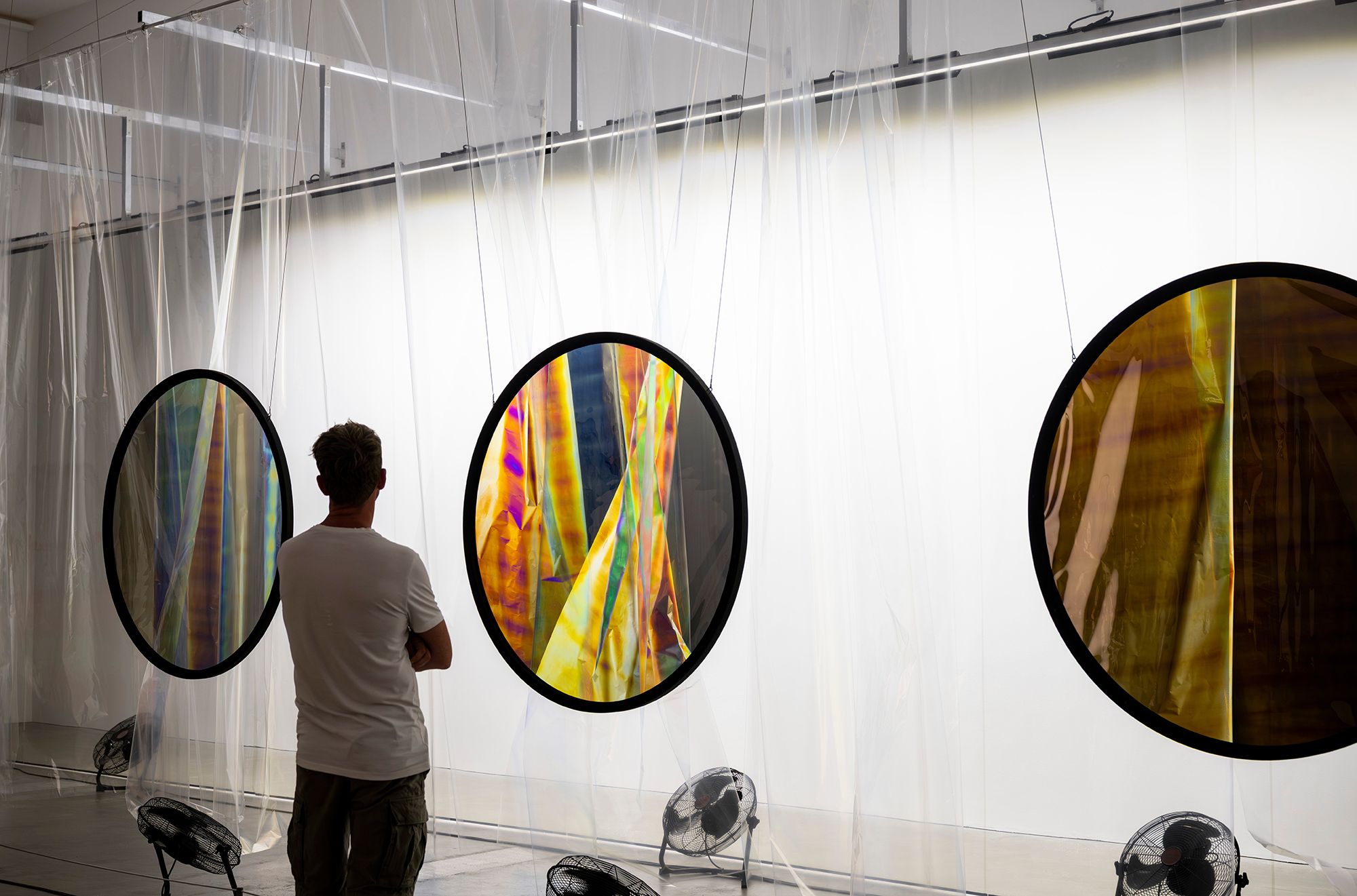 Olafur Eliasson, Denmark b.1967 / Your truths 2025 / Polarisation filters, PET, PVC, BOPP foil, fans, metal, control units / © 2025 Olafur Eliasson / Courtesy: The artist; neugerriemschneider, Berlin; and Tanya Bonakdar Gallery, New York / Photograph: C Callistemon © QAGOMA