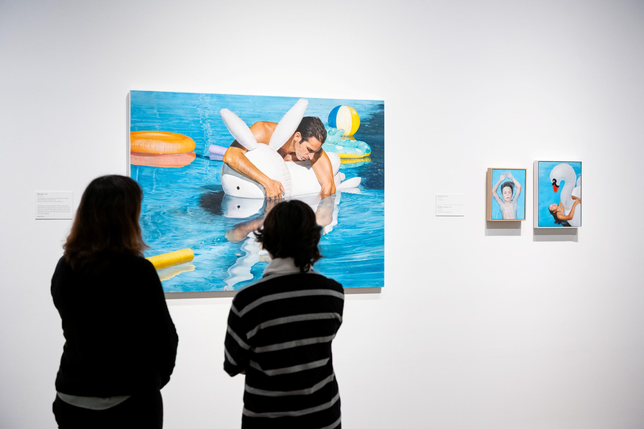 Visitors at the Gallery of Modern Art, featuring Bad dad 2013 by Michael Zavros / Purchased 2016 with funds raised through the Queensland Art Gallery | Gallery of Modern Art Foundation Appeal / Collection: Queensland Art Gallery | Gallery of Modern Art / © Michael Zavros Photograph: C. Callistemon