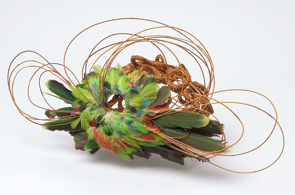 Shirley Macnamara, Indjalandji/Alyawarr, Australia b.1949 / Bush fascinator 2013 / Spinifex with crimson wing feathers / 17 x 43 x 17cm / Purchased with the assistance of the Cairns Regional Gallery Foundation, 2014 / Collection: Cairns Art Gallery / © Shirley Macnamara