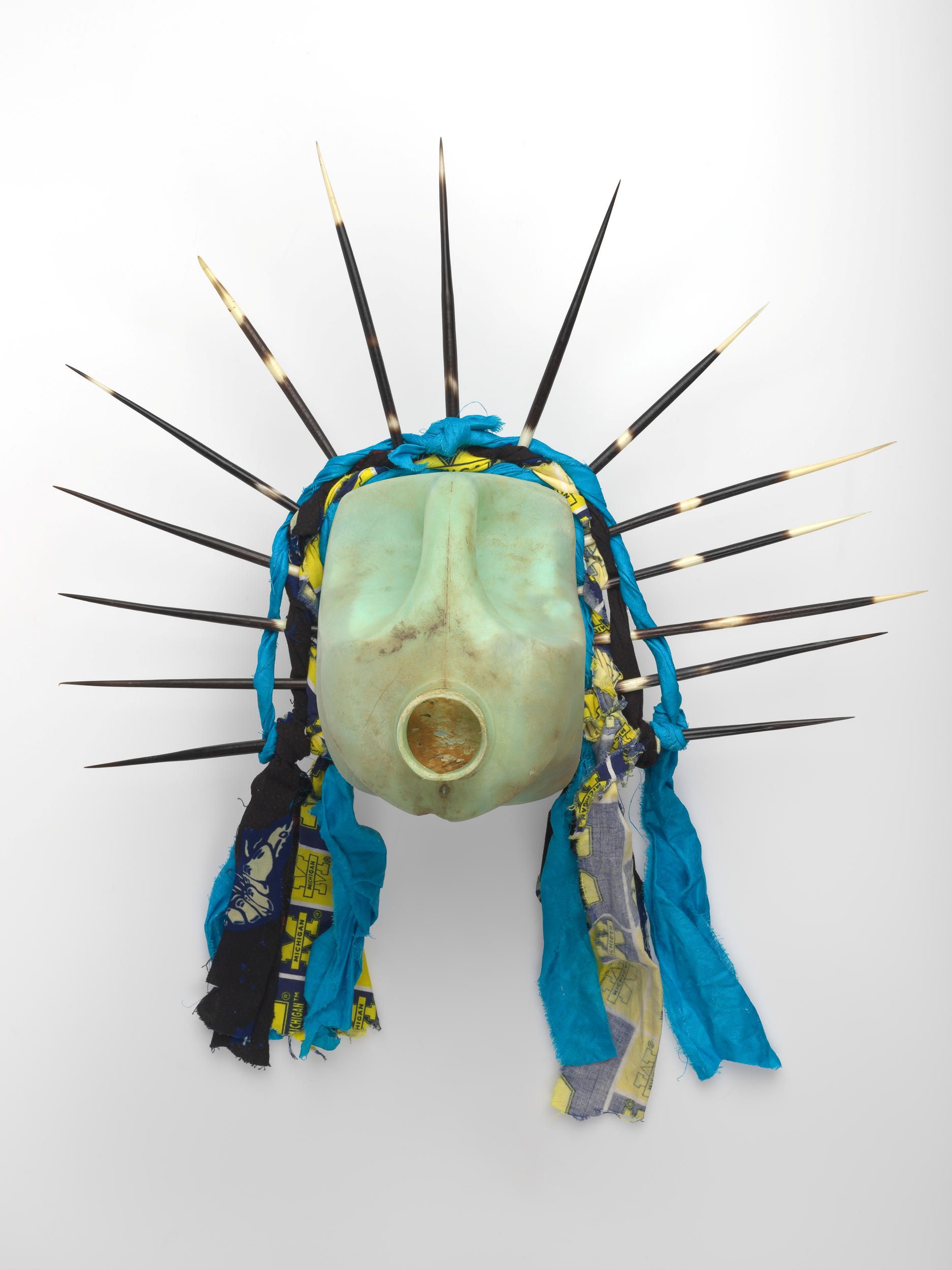 Romuald Hazoumè / Benin b.1962 / Liberte 2009 / Plastic, porcupine quills and fabric / 50 x 43 x 25cm / Purchased 2010 with a special allocation from the Queensland Art Gallery Foundation / Collection: QAGOMA, Brisbane / © Romuald Hazoumè/ADAGP/Copyright Agency