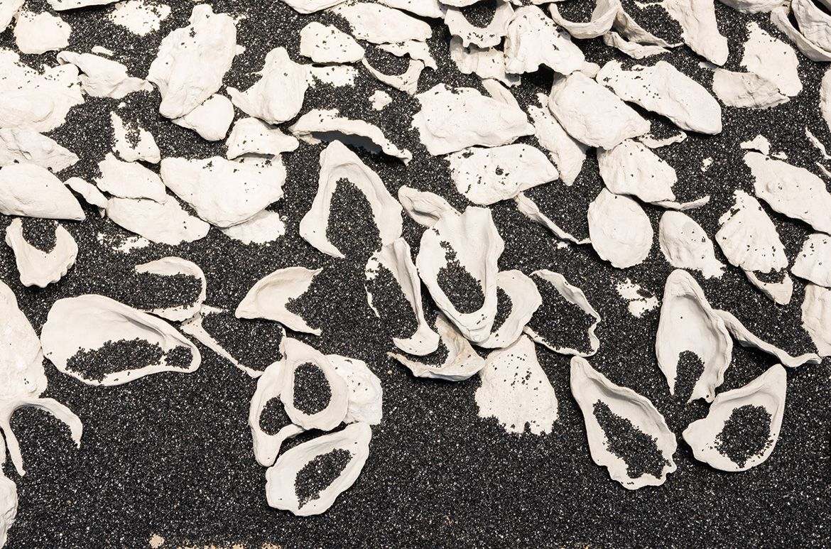 Megan Cope, Quandamooka people, Australia b.1982 / RE FORMATION 2019 / 12 000 pieces of cast-concrete, ilmenite / Purchased 2019 with funds from the Contemporary Patrons through the Queensland Art Gallery | Gallery of Modern Art Foundation / Collection: Queensland Art Gallery | Gallery of Modern Art / © Megan Cope