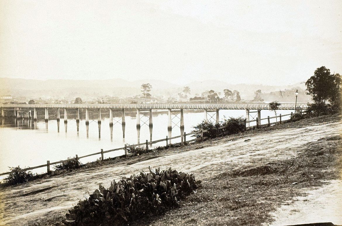 GP Wright, Australia c.1815–91 / Victoria Bridge, from William Street (from ‘Brisbane illustrated’ portfolio) c.1874-79 / Albumen photograph on paper mounted on card / 19.5 x 24.5cm (comp.) / Acc. 2005.354 / Purchased 2005 / Collection: Queensland Art Gallery | Gallery of Modern Art