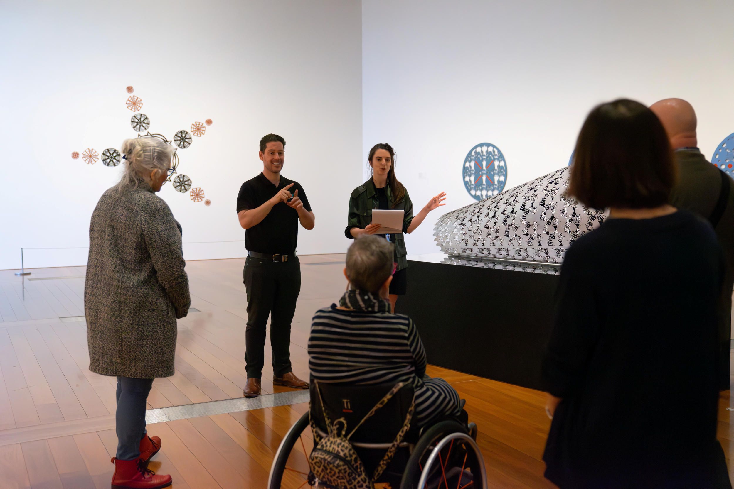 Visitors on a Auslan interpreted tour at Gallery of Modern Art | Photograph: L. Walker