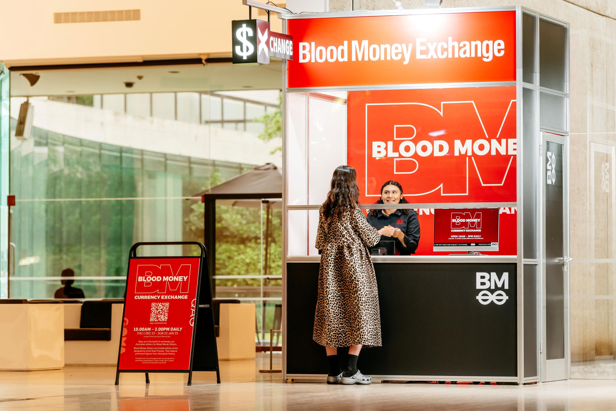 Ryan Presley, Marri Ngarr people, b.1987 / Blood Money Currency Exchange Terminal 2018-ongoing ( installation view) / Presented as part of ‘Embodied Knowledge: Queensland Contemporary Art’ / November 2022 / Image courtesy: Queensland Art Gallery | Gallery of Modern Art / Photograph: Joe Ruckli