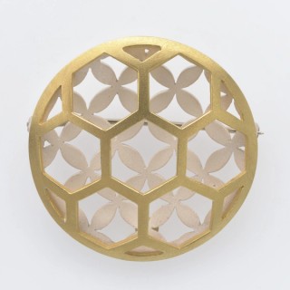 Barbara Heath, Australia b.1954 / Mashrabia-inspired lattice brooch 1993-94 / 18k yellow gold, sterling silver / 3.6 (diam.) x 1.3cm / Purchased 2006 with funds from the Estate of Jessica Ellis through the QAG Foundation / Collection: Queensland Art Gallery | Gallery of Modern Art / © Barbara Heath