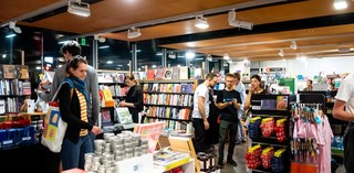 Customers shopping in the GOMA Store / Photo: Chloe Callistemon