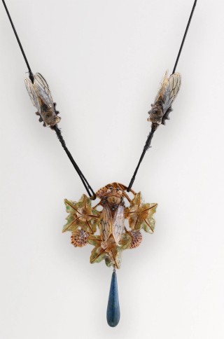 Georges Pierre, France 1873–1943 / Cicada pendant necklace c.1910 / Buffalo horn, blue glass, silk chord / 11.5 x 8cm / Purchased 2023 with funds from the Henry and Amanda Bartlett Trust through the QAGOMA Foundation / Collection: Queensland Art Gallery | Gallery of Modern Art