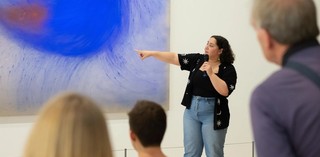 Facilitator Logan Bobongie with audience at 'Art & This Place' | Queensland Art Gallery, Brisbane | February 2023 |  Image courtesy: Queensland Art Gallery | Gallery of Modern Art / Photography: C Baxter, QAGOMA