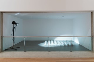 Aleks Danko, Australia b.1950 / DAY IN DAY OUT (second version) 1991 / Cast aluminium and theatre light on metal support / 11 x 260 x 229cm / Purchased 1992 / Collection: Queensland Art Gallery / © Queensland Art Gallery / Photograph: Natasha Harth © QAGOMA