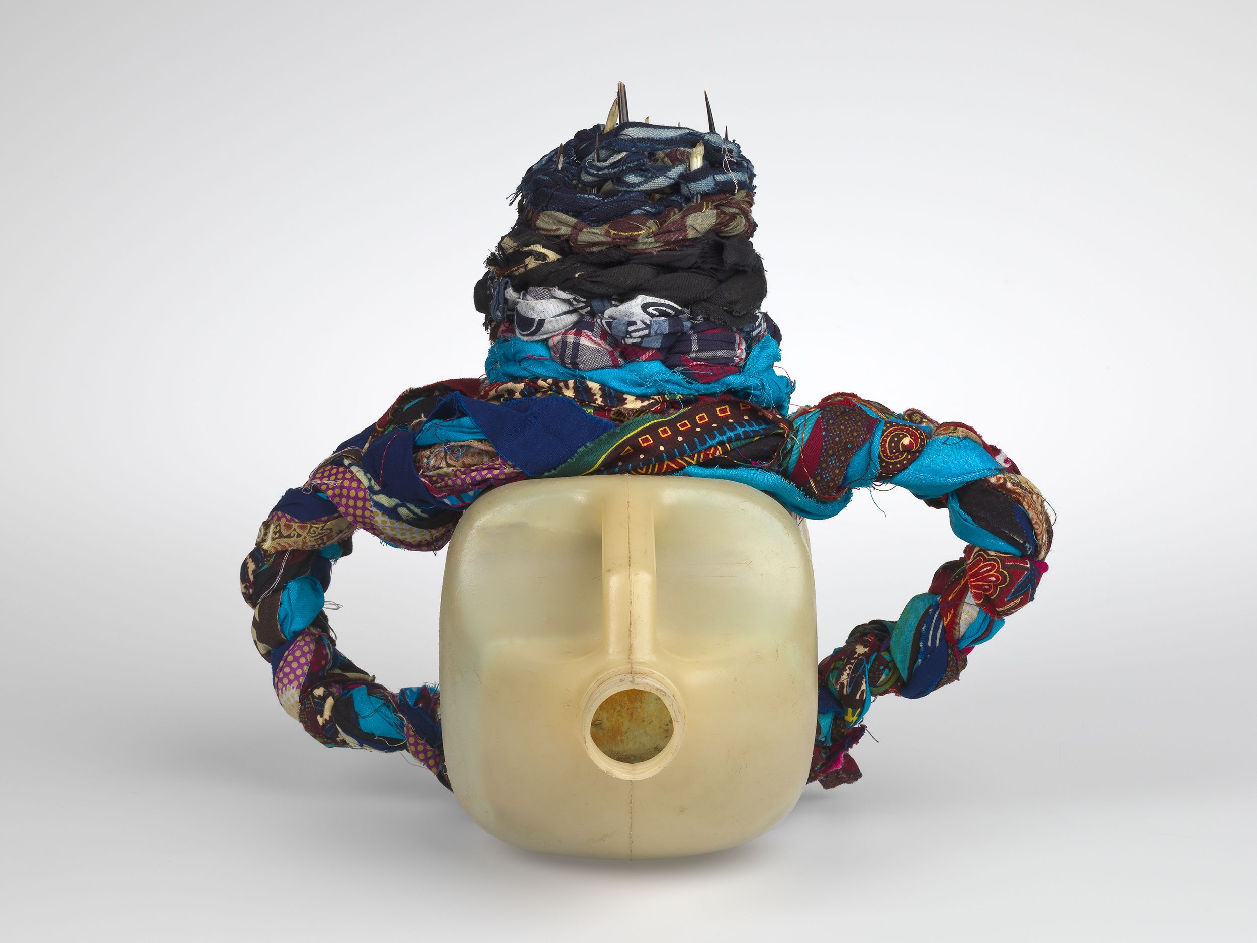Romuald Hazoume / Benin b.1962 / Nest Violeta 2009 / Plastic, porcupine quills and fabric / 29 x 28 x 27cm / Purchased 2010 with a special allocation from the Queensland Art Gallery Foundation / Accession No: 2010.009 / Collection: Queensland Art Gallery | Gallery of Modern Art / © Romuald Hazoume/ADAGP/Copyright Agency
