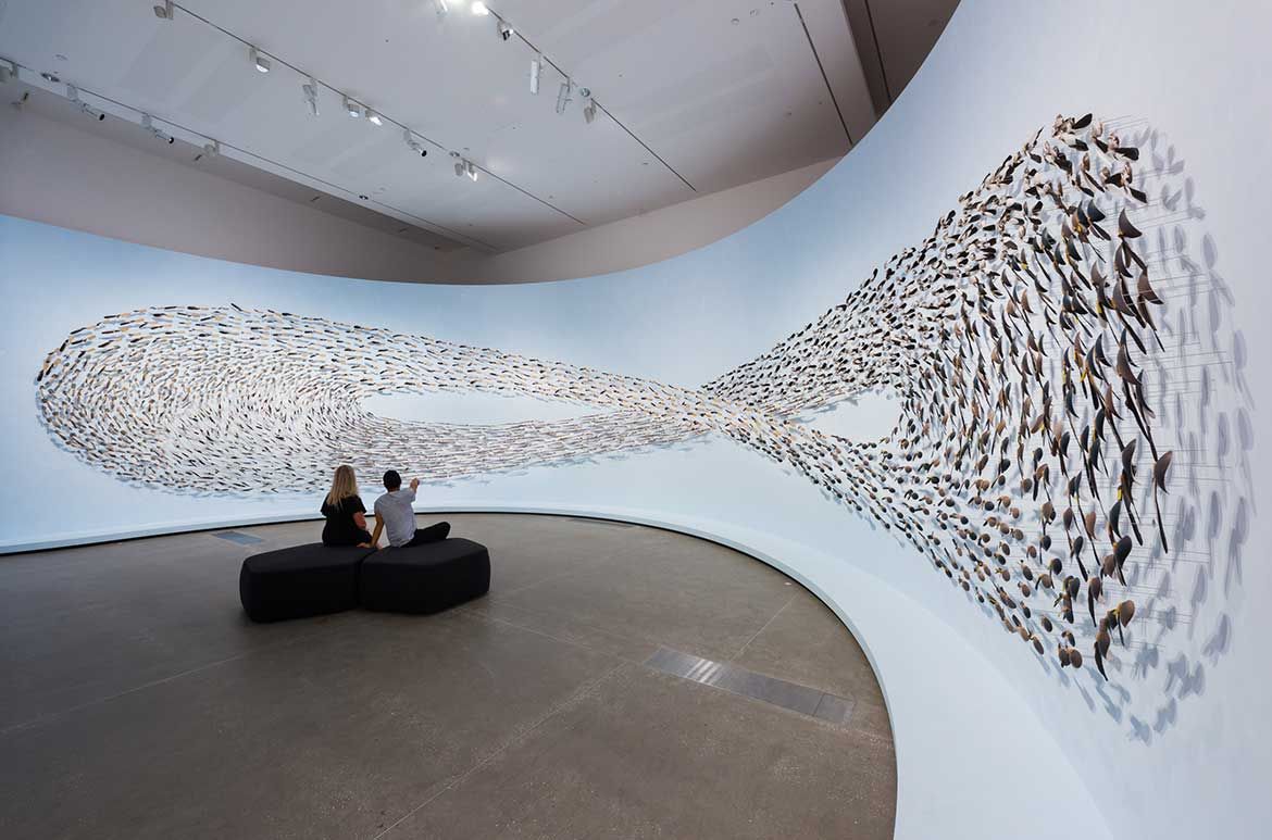 Jonathan Jones, Wiradjuri/Kamilaroi peoples, Australia b.1978, with Dr Uncle Stan Grant Snr AM, Wiradjuri people, Australia b.1940 / (untitled) giran (detail) 2018 / Bindu-gaany (freshwater mussel shell), gabudha (rush), gawurra (feathers), marrung dinawan (emu egg), walung (stone), wambuwung dhabal (kangaroo bone), wayu (string), wiiny (wood), 48-channel soundscape / Sound design: Luke Mynott, Sonar Sound / © The artists / Photograh: Natasha Harth © QAGOMA / This project has been assisted by the Australian Government through the Australia Council, its arts funding and advisory body; the NSW Government through Create NSW; and the Copyright Agency Cultural Fund. This project has also been supported by Carriageworks through the Solid Ground program.