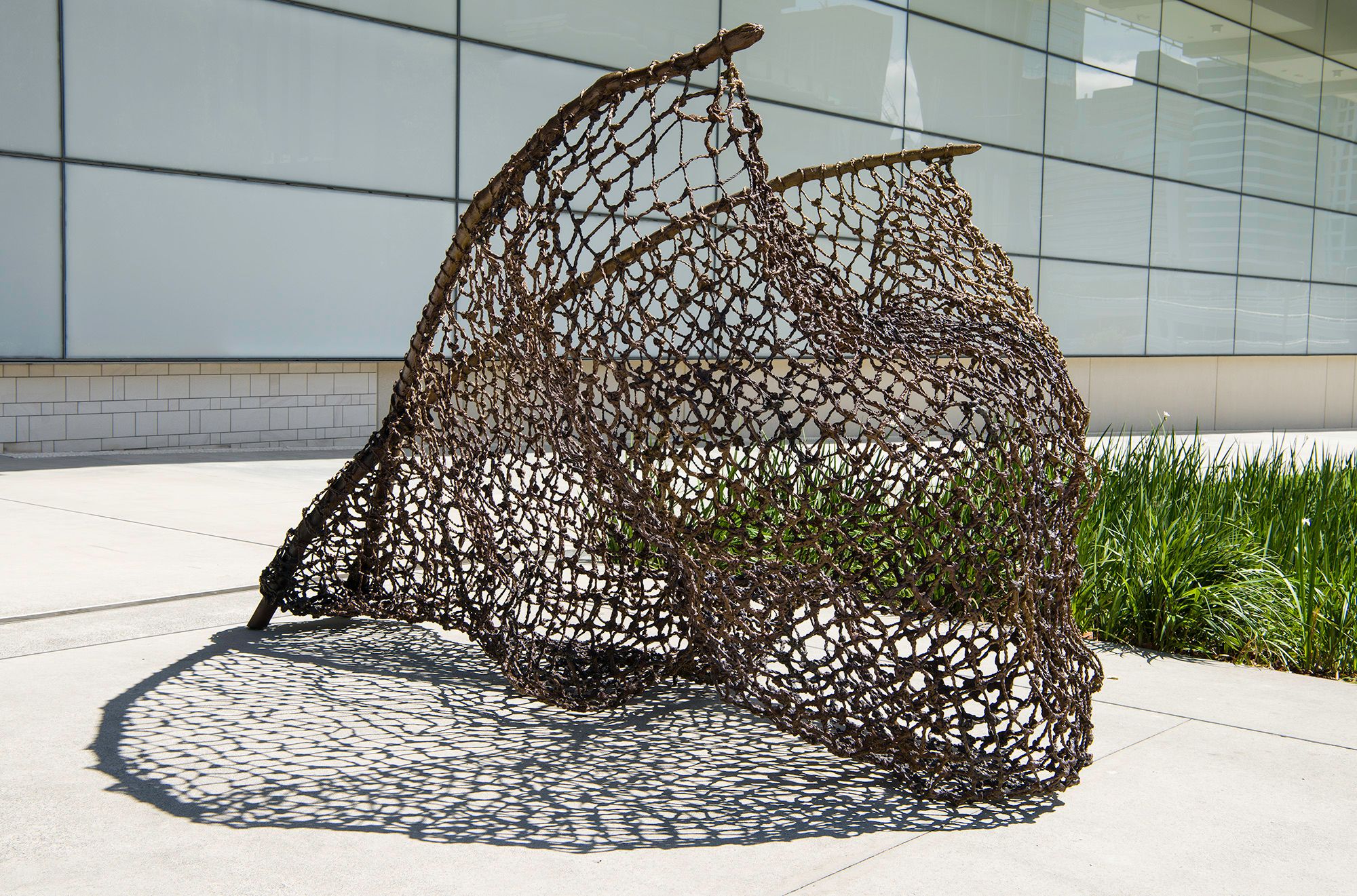 Judy Watson, Waanyi people, Australia b.1959 / tow row 2016 / Bronze / 193 x 175 x 300cm (approx.) / Commissioned 2016 to mark the tenth anniversary of the opening of the Gallery of Modern Art. This project has been realised with generous support from the Queensland Government, the Neilson Foundation and Cathryn Mittelheuser AM, through the QAGOMA Foundation / Collection: Queensland Art Gallery | Gallery of Modern Art / © Judy Watson