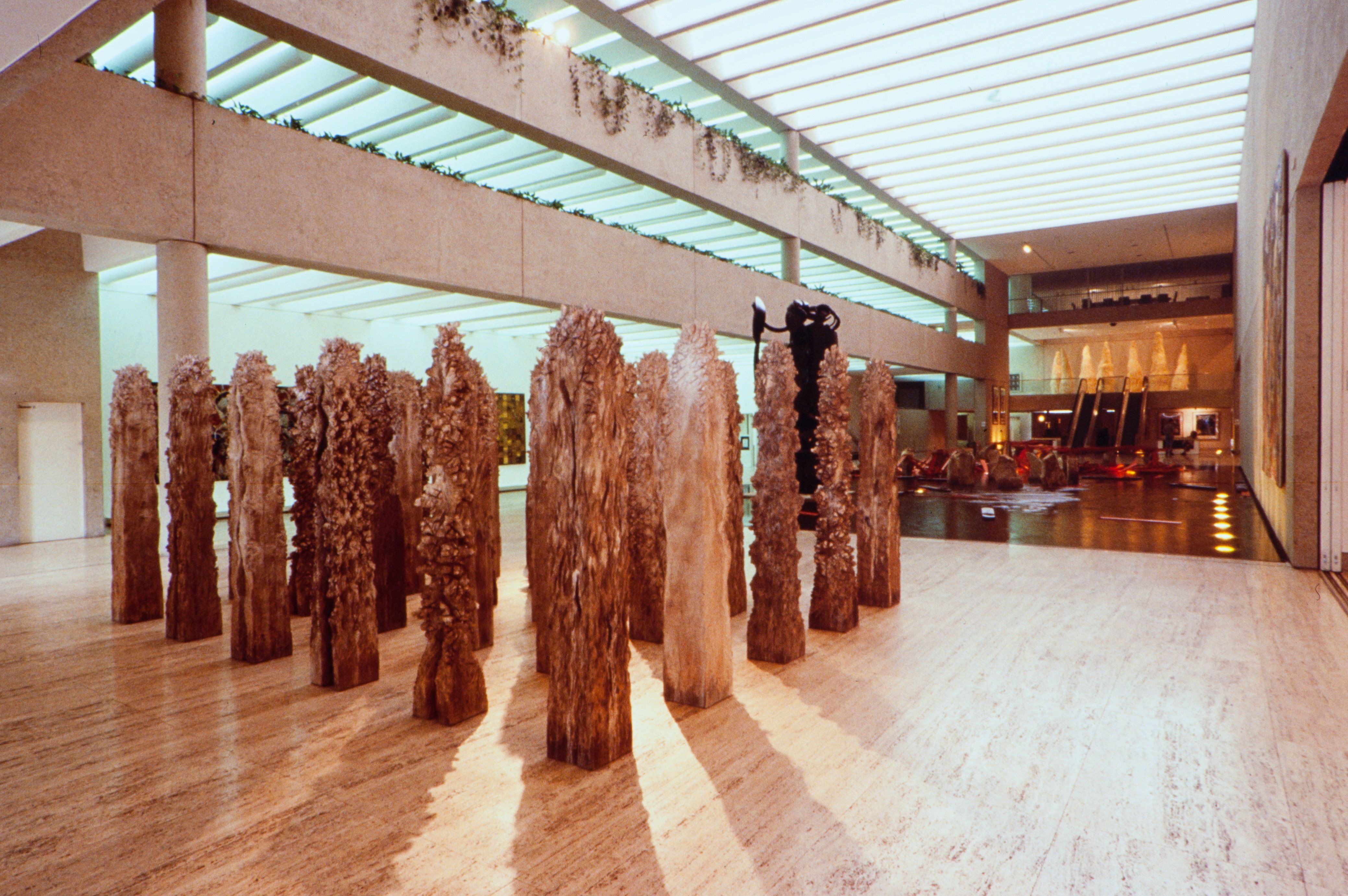 Shigeo Toya, Japan b.1947 / Woods III 1991-92 / Wood, ashes and synthetic polymer paint / 30 pieces: 220 x 30 x 30cm; 220 x 530 x 430cm (installed) / The Kenneth and Yasuko Myer Collection of Contemporary Asian Art. Purchased 1994 with funds from The Myer Foundation and Michael Sidney Myer through the Queensland Art Gallery Foundation and with the assistance of the International Exhibitions Program / Collection: Queensland Art Gallery | Gallery of Modern Art / © Shigeo Toya