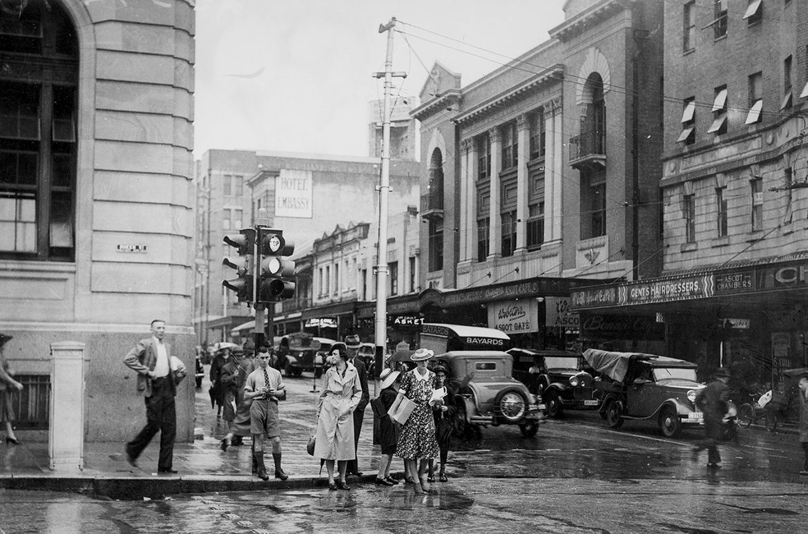Corner of Queen and Edward Streets Brisbane, 1940 / 82490 / Image courtesy: John Oxley Library, State Library of Queensland, Brisbane / The building on the left is the third Australian Mutual Provident (AMP) Society building, known today as Macarthur Chambers, completed 1934