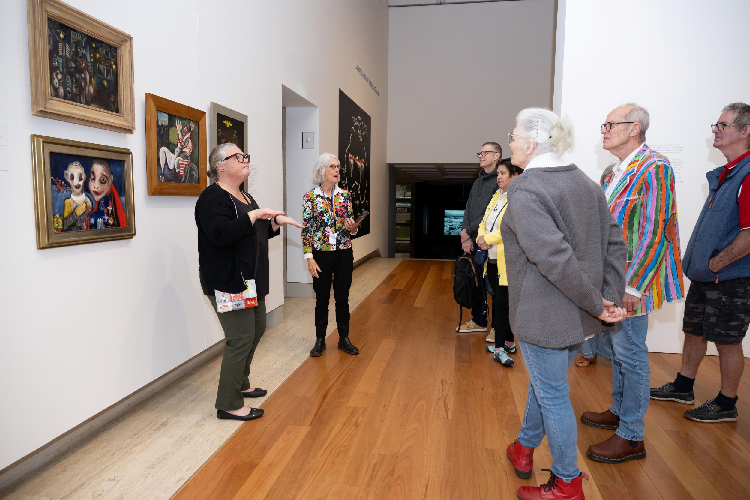 Visitors on an Auslan interpreted tour at QAG | Installation view | Photograph: N Umek
