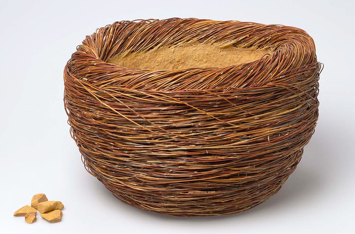 Shirley Macnamara, Indjalandji/Alyawarr, Australia b.1949 / Spinifex vessel, bowl 1998 / Twined spinifex runner roots vessel lined with yellow ochre, including 5 pieces of yellow ochre / 25 x 41 x 38cm / Purchased with funds from the Visual Arts Craft Board of the Australia Council, 1998 / Collection: City of Townsville Art Collection / © Shirley Macnamara