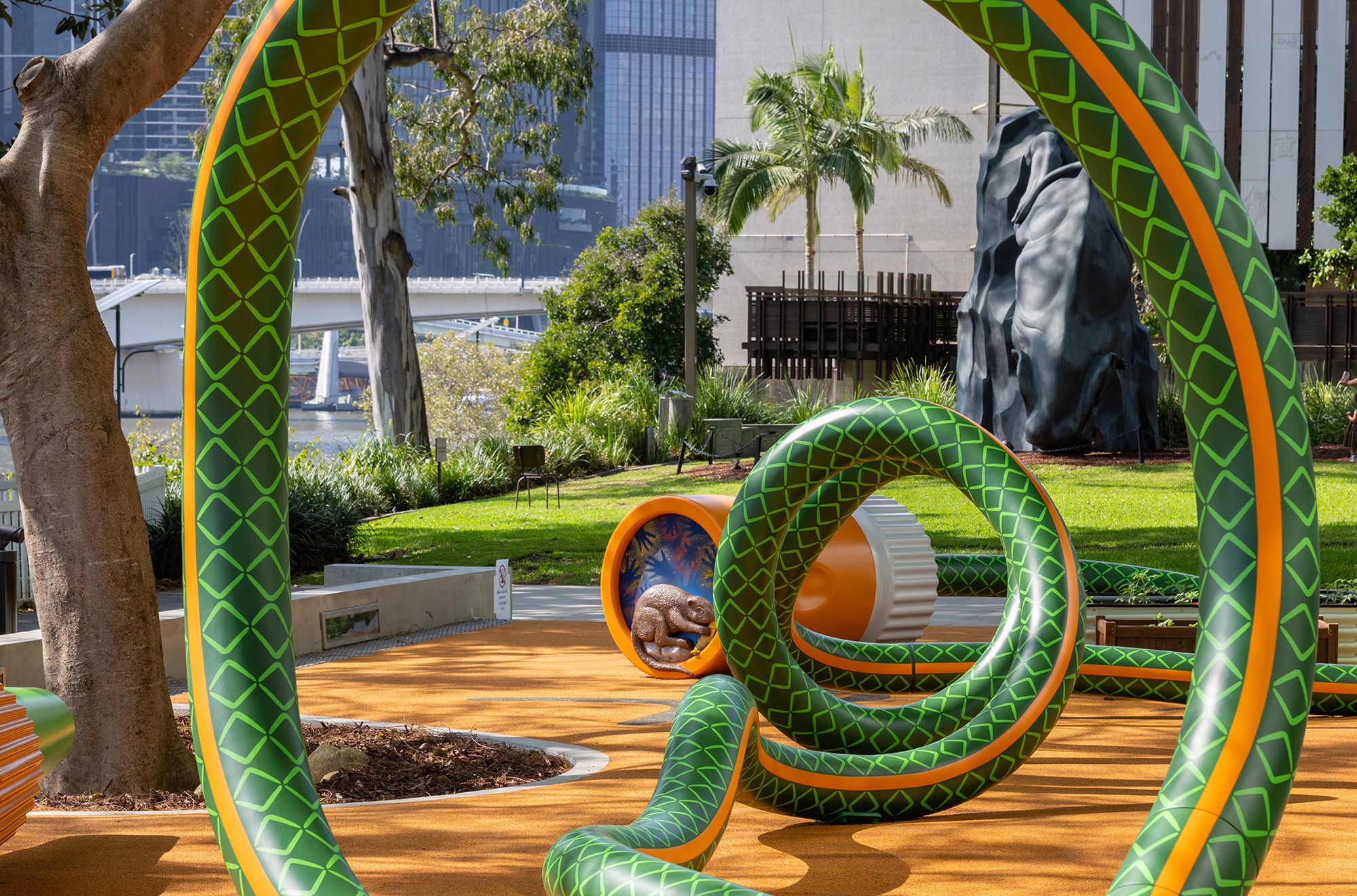 Tony Albert, Girramay/Yidinyji/Kuku Yalanji peoples, Australia b.1981 / Nell, Australia b.1975 / The Big Hose (detail) 2022–25 / Aluminium, reclaimed hardwood, paint, rubber / Commissioned 2022. This project has been realised with generous support from Andrew and Dr Susan King, the Neilson Foundation, Margaret Mittelheuser AM and Cathryn Mittelheuser AM, Gina Fairfax AC, Dr Shirley Hsieh, and the 2022 QAGOMA Foundation Appeal / Collection: Queensland Art Gallery | Gallery of Modern Art / © Tony Albert and Nell / Photograph: N Umek © QAGOMA