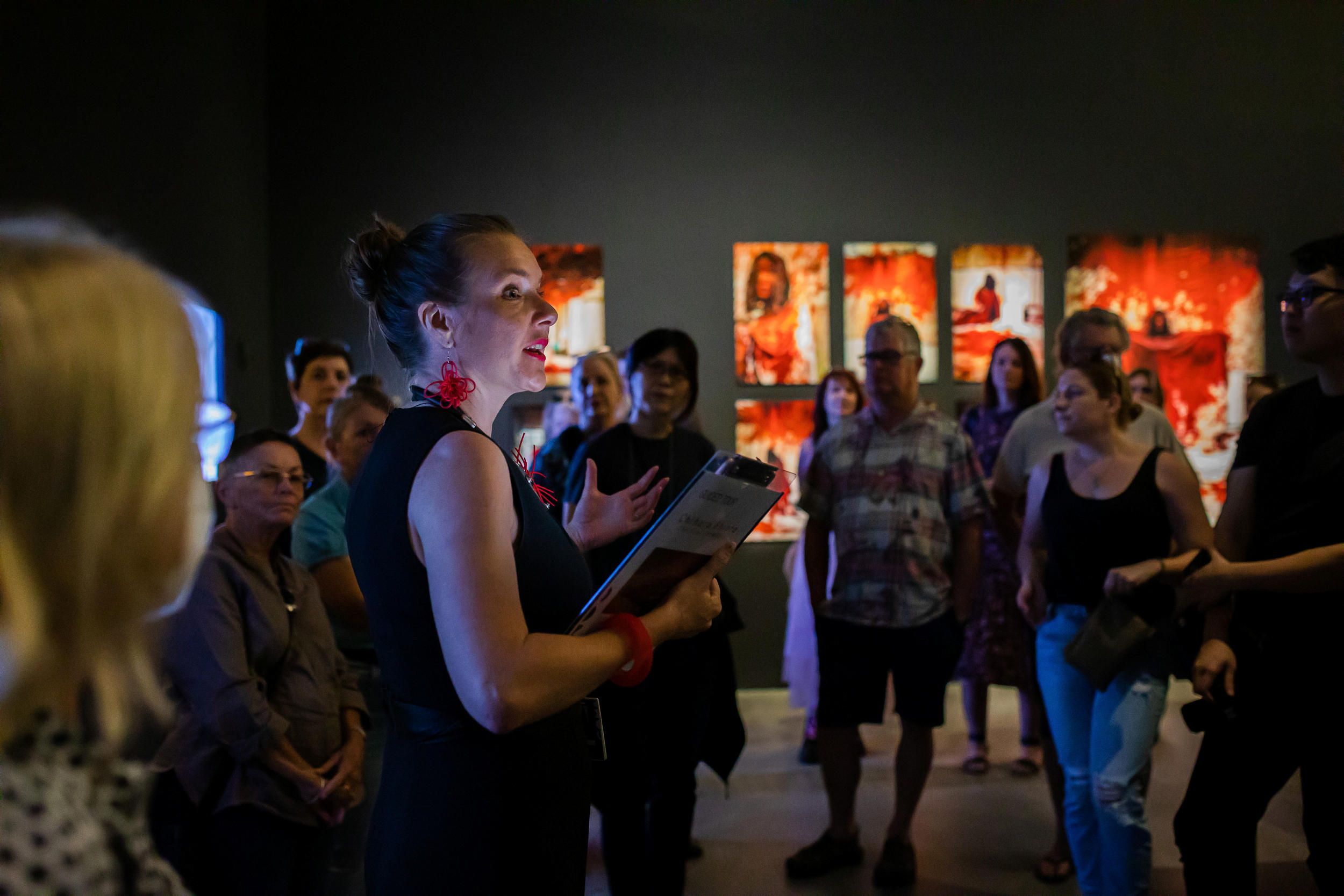 A Volunteer Guide leads visitors on a tour at GOMA. / Photography: Katie Bennett / © QAGOMA 