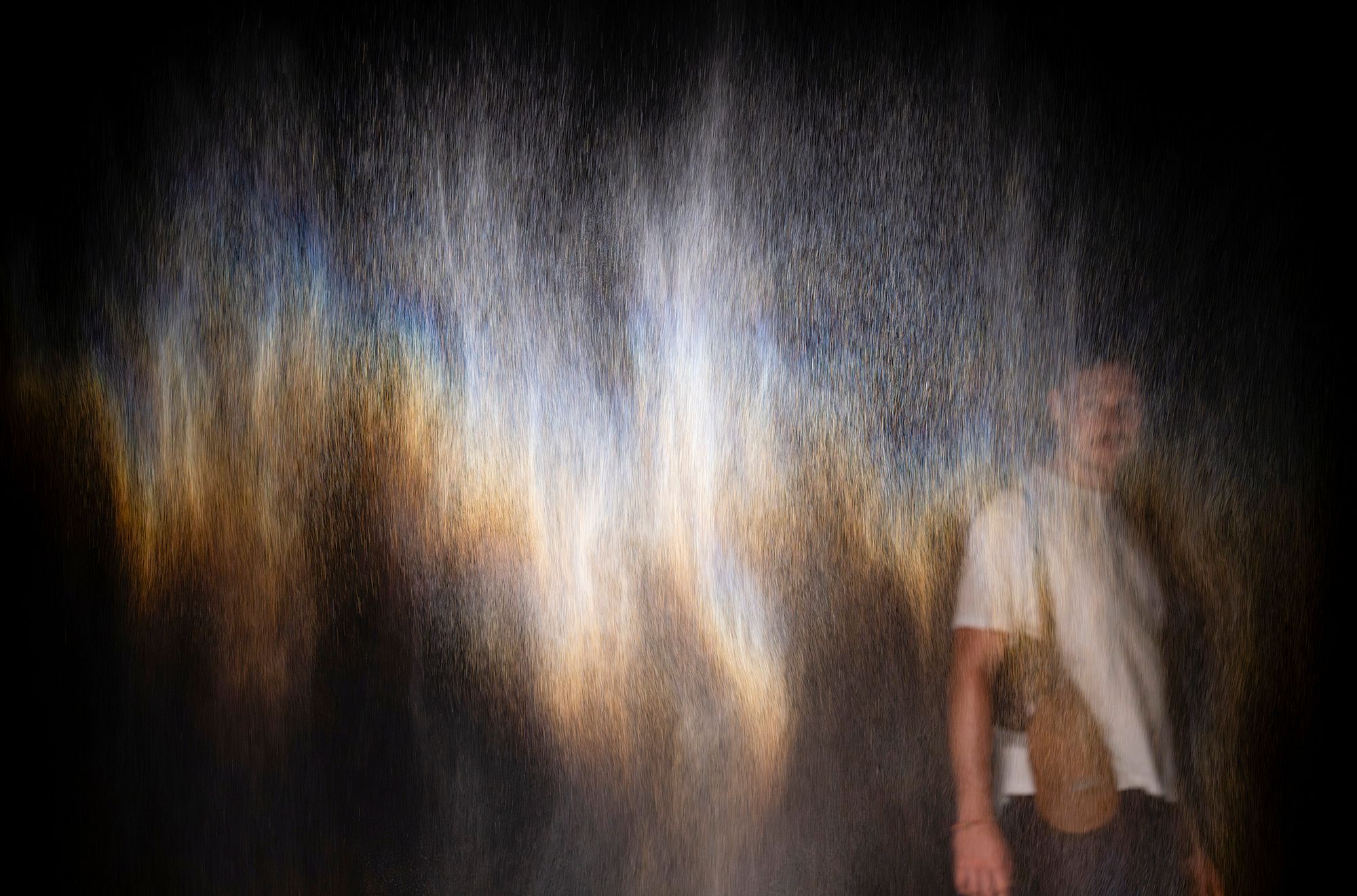 Olafur Eliasson, Denmark b.1967 / Beauty 1993 / Spotlight, water, nozzles, hose, pump / Purchased 2025. The Josephine Ulrick and Win Schubert Charitable Trust / Collection: The Josephine Ulrick and Win Schubert Charitable Trust, Queensland Art Gallery | Gallery of Modern Art / © 1993 Olafur Eliasson / Photograph: J Ruckli © QAGOMA