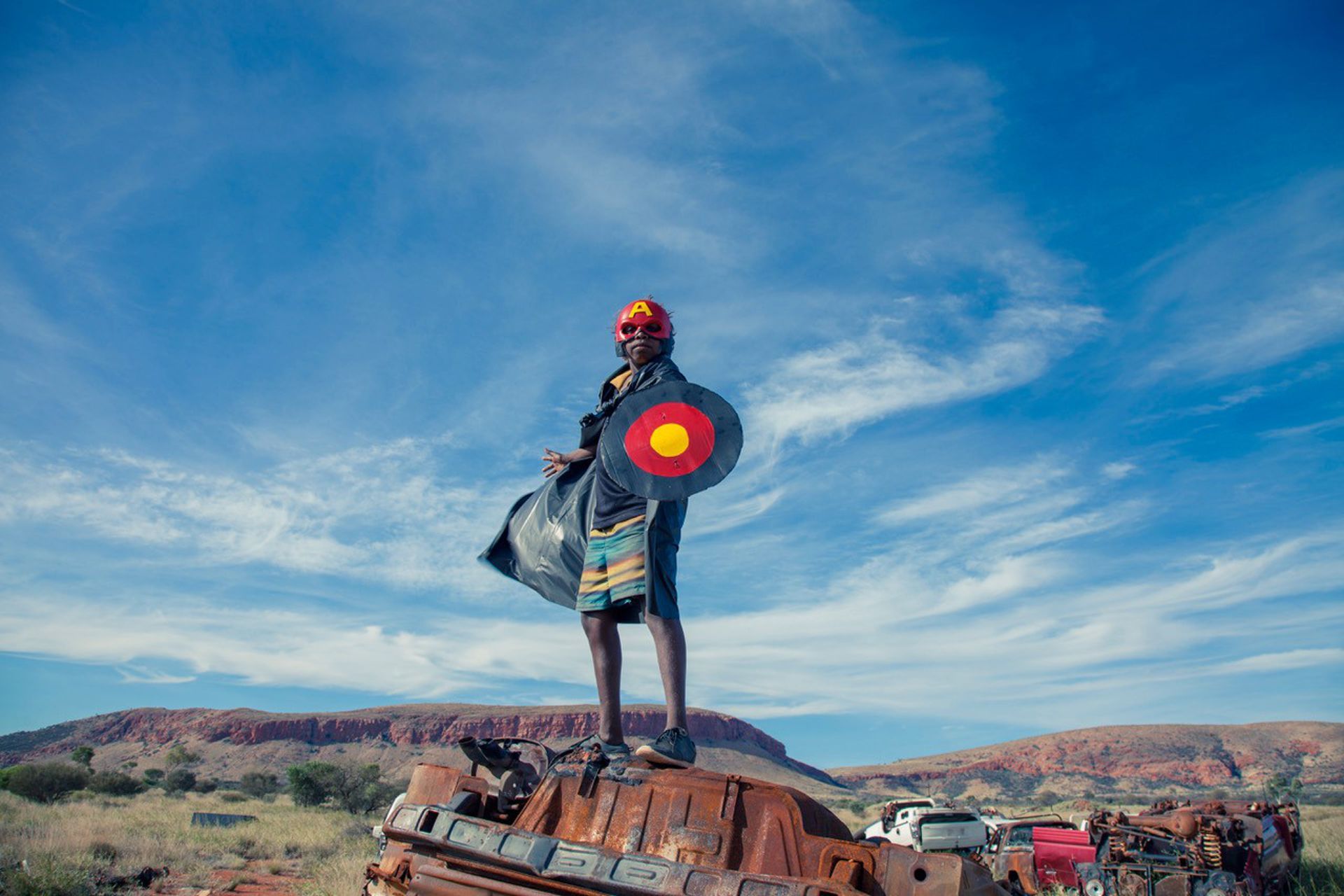 Tony Albert, David C Collins and Kieran Lawson Warakurna - Superheroes #1 2017 / Archival pigment print on paper, 100 x 150cm, edition of 3 + 2AP