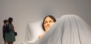 Ron Mueck, England b. 1958 / Installation view of In bed 2005 / Mixed media / 161.9 x 649.9 x 395cm / Purchased 2008. Queensland Art Gallery | Gallery of Modern Art Foundation / Collection: Queensland Art Gallery | Gallery of Modern Art © Ron Mueck