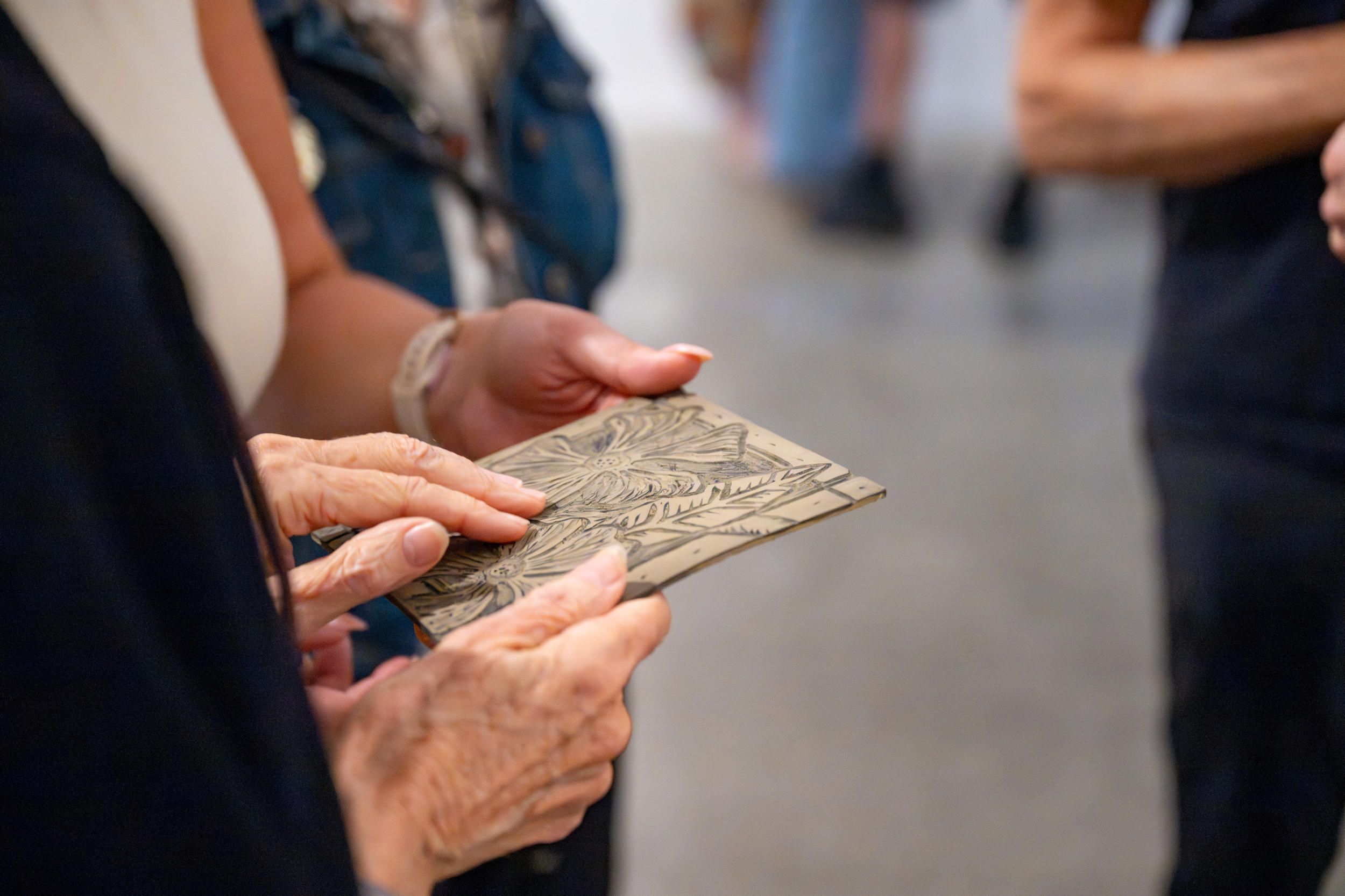 Visitor with on a tactile tour / Photograph: Nicolas Umek