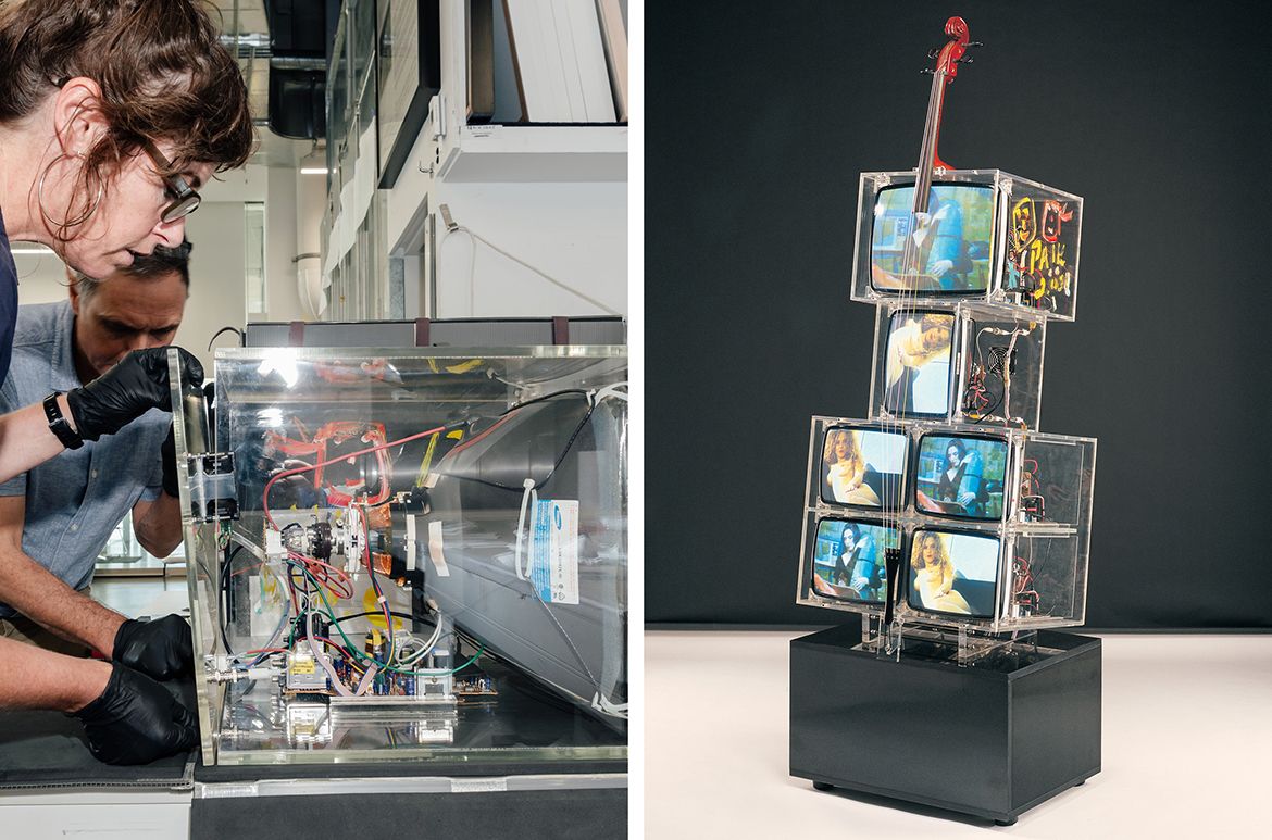 Nam June Paik, United States/South Korea 1932-2006 / TV cello 2000 / DVDs, video monitors, perspex, wooden cello neck with coloured plastic strings and wooden tail piece, marble base / 232.2 x 75 x 55cm (overall); wooden cello neck and coloured plastic strings and wooden tail piece: 187 x 20 x 15.5cm; three perspex boxes containing video monitors: 38 x 48 x 51cm, 34.5 x 28 x 51cm, 55 x 68.5 x 51cm; perspex arch: 1 x 11.5 x 9cm; perspex string bracket: 9 x 2.5 x 39.7cm; perspex base: 12.9 x 6.9 x 8cm; marble base: 40 x 75 x 55cm / The Kenneth and Yasuko Myer Collection of Contemporary Asian Art. Purchased 2002 with funds from The Myer Foundation, a project of the Sidney Myer Centenary Celebration 1899-1999, through the QAG Foundation / Collection: Queensland Art Gallery | Gallery of Modern Art / © Nam June Paik/Copyright Agency
