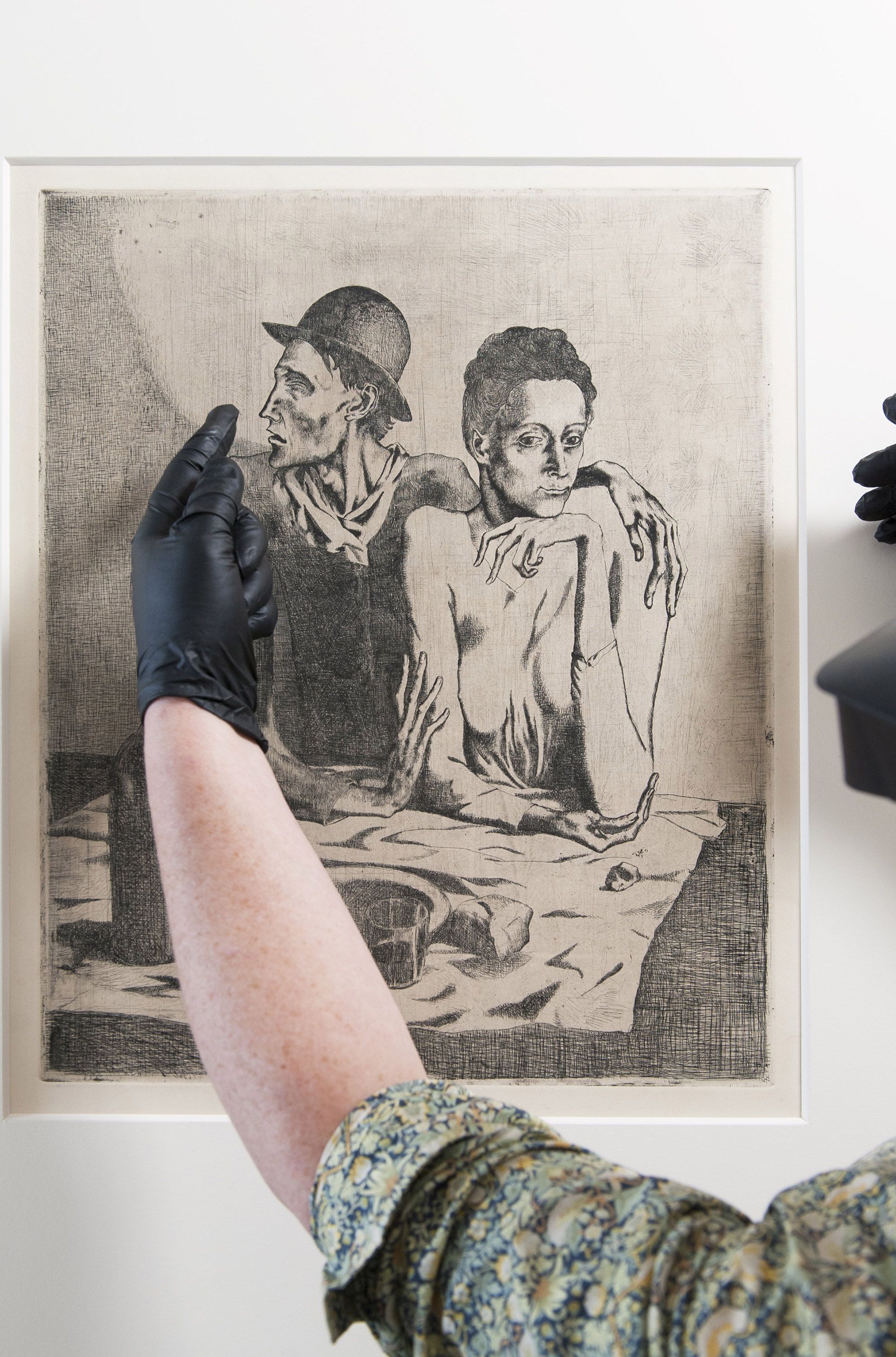 Pablo Picasso, Spain 1881–1973 / Le Repas frugal (The frugal meal)(from 'La Suite des Saltimbanques' series) 1904, printed 1913 / Etching and scraper on Van Gelder Zonen wove paper / 66 x 51cm / Purchased 2015 with funds from the Margaret Olley Art Trust through the QAGOMA Foundation / Collection: Queensland Art Gallery | Gallery of Modern Art / © Succession Picasso/Copyright Agency / Photograph: M Sherwood © QAGOMA